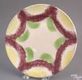 Red yellow and green rainbow spatter plate