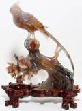 CHINESE CARVED AGATE BIRD ON FLOWERING BRANCH