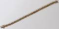 LADYS 10 KT AND DIAMOND TENNIS BRACELET