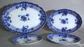 Four Doulton flow blue platters