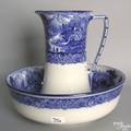 Royal Doulton flow blue pitcher and basin in the Geneva pattern