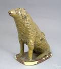 Glazed earthenware figure of a dog