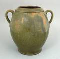 Orange and green glazed ovoid crock mid 19th c