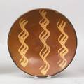 Pennsylvania redware charger 19th c
