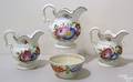 Three Staffordshire molded matching pitchers 19th c