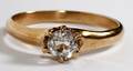 14KT YELLOW GOLD AND 015 CT ROUND CUT STONE RING