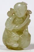 CARVED JADE FIGURE OF YOUNG BOY