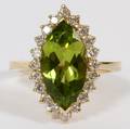 350CT NATURAL PERIDOT  50CT DIAMONDS RING