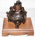 091364 CHINESE BRONZE INCENSE BURNER ON A WOOD BASE