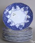 Twelve matching flow blue plates