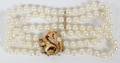 PEARL TRIPLESTRAND BRACELET W 14KT GOLD CLASP