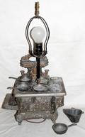 091389 ANTIQUE IRON PLAY STOVE AS A LAMP H21