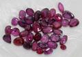 101457 UNMOUNTED RUBIES 37 1465CT TW