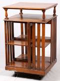 OAK REVOLVING BOOKSTAND EARLY 20TH C