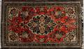 KESHAN SILK ORIENTAL RUG USED AS A WALL HANGING