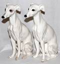 GLAZED CERAMIC FIGURES OF SEATED WHIPPETS PAIR