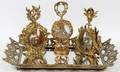 GILT METAL PERFUME BOTTLES  TRAY FOUR PIECES