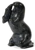 INUIT CARVED STONE SCULPTURE ANIMAL WITH FISH