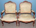 LOUIS XV STYLE CARVED WALNUT OPEN ARMCHAIRS