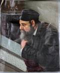 OIL ON CANVAS ILLEGIBLY SIGNED RABBI READING