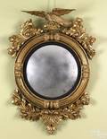 Carved giltwood convex mirror ca 1800
