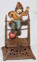 ANTIQUE CAST IRON MECHANICAL BANK BOY ON A BALL