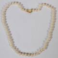 PEARL NECKLACE WITH PEARL  DIAMOND CLASP