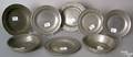 Eight English pewter basins and plates