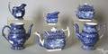 Ironstone flow blue tea service to include teapot