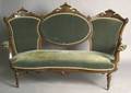 Victorian carved parlor set to include 2 sofas