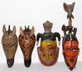 AFRICAN CARVED WOOD CEREMONIAL MASKS FOUR