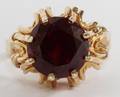 25 CT GARNET SET IN 14 KT GOLD RING