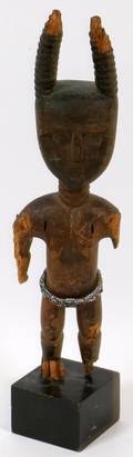 CARVED AFRICAN TRIBAL STANDING FIGURE W HORNS