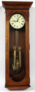 HOWARD MILLER OAK CASE HANGING CLOCK