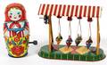 TIN TOY RIDE  RUSSIAN STACKED DOLL