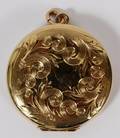 14 KT YELLOW GOLD ROUND LOCKET