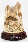 051138 CHINESE CARVED IVORY FIGURES WITHIN A LANDSCAPE
