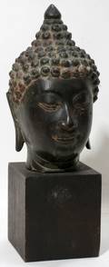 022339 BRONZE BUDDHA HEAD ON A WOOD BASE H 7