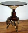 031445 GILT  PINE TABLE WITH ELEPHANT MASK SUPPORTS