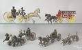 Five assorted horse drawn cast iron fire toys