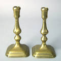 Pair of Queen Anne brass candlesticks mid 18th c
