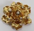 071103 18KT YELLOW GOLD  DIAMOND FLORAL BROOCH W 1 1