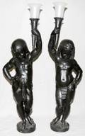 092066 EGYPTIAN REVIVAL STYLE CAST IRON TORCHIERES