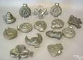 Fourteen pewter ice cream molds