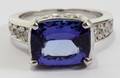 062151 400CT TANZANITE  150CT DIAMOND RING