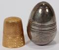 111291 14KT YGOLD THIMBLE IN A SILVER CASE L 1 14