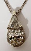 081201 14KT WGOLD  DIAMOND PENDANT ON A CHAIN