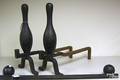 Pair of cast iron bowling pin andirons