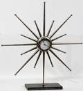 071366 CONTEMPORARY METAL STARBURST CLOCK H 22 W 21