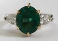 080017 522CT NATURAL EMERALD  1CT SIDE DIAMOND RING